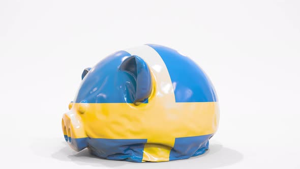 Deflating Piggy Bank with Printed Flag of Sweden