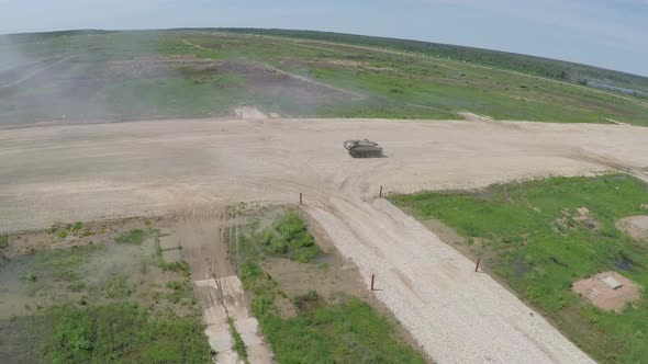 Aerial shot of military vehicles on shooting-ground