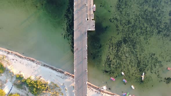 Flying over the pier in Jastarnia on Hel peninsula at the Baltic Sea in Poland