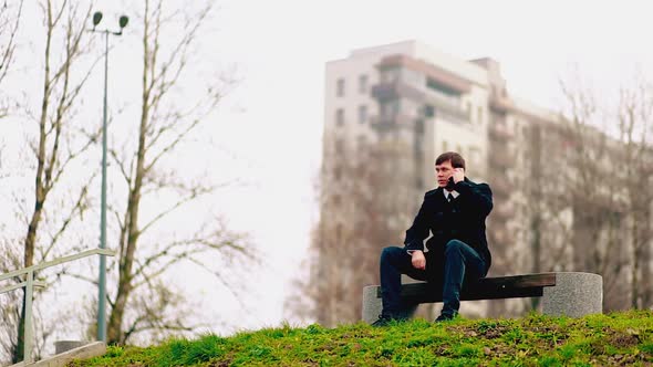 Male Businessman Outdoors Talking on the Phone