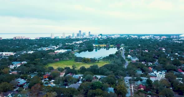 4K Aerial Video Flying at High Speed Towards Downtown St Petersburg over Crescent Lake Park