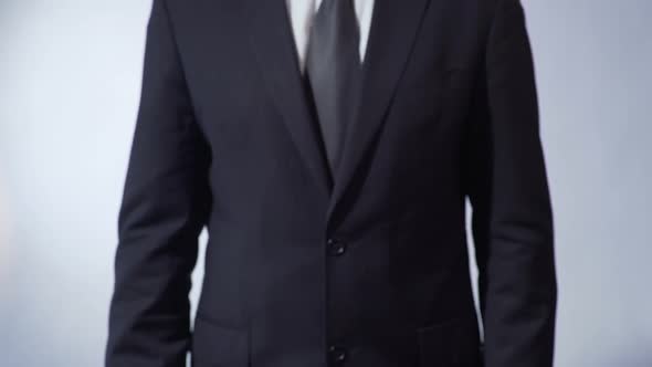 Business Written on Blackboard Man in Suit Holding Sign Leadership Goals