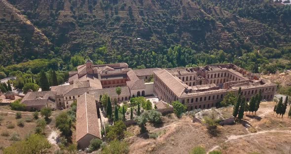 Aerial view of a monastery with ruins.