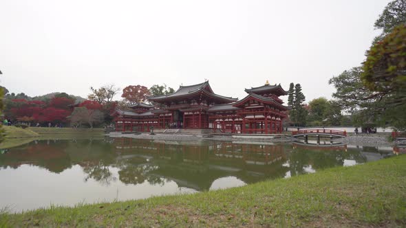 Byodoin temple (Byodo-in) with autumn leaves, Uji City, Kyoto, Japan.