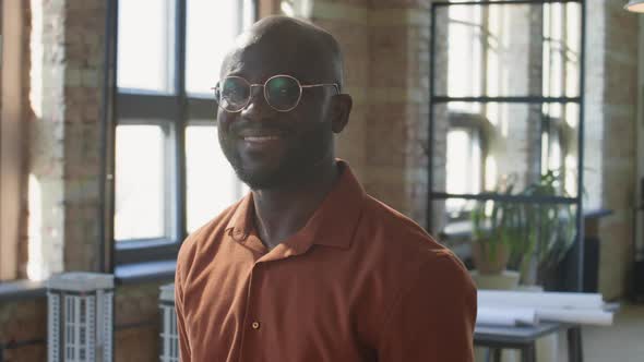 Portrait of Happy African American Man in Architectural Office