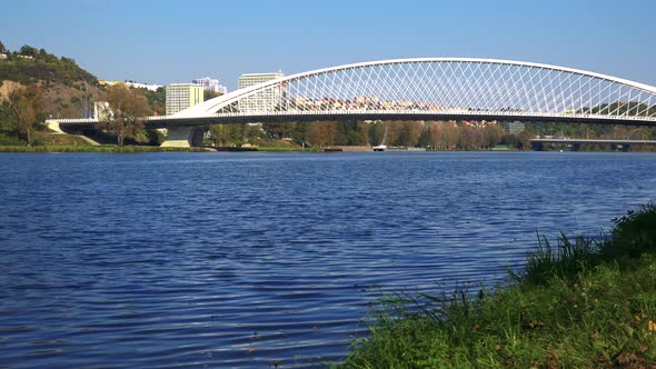 A White Modern Bridge in an Urban Area on a Sunny Day