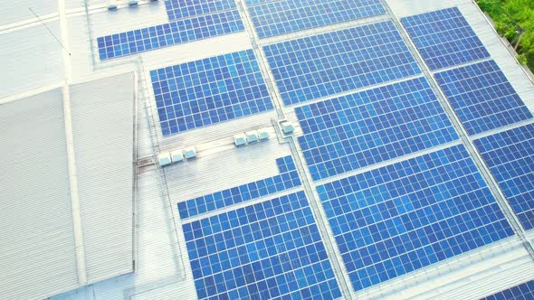 Drone flying over photovoltaic solar panels