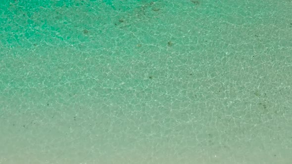 Wide Tropical Beach with White Sand View From Above