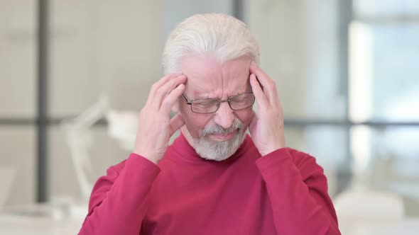 Old Man Having Headache