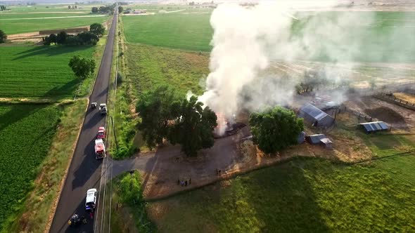 Aerial footage of house burning down