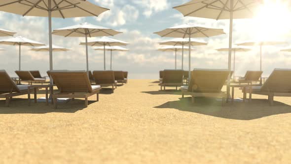 Empty Wooden Deck Chairs and Umbrellas on Beach alt