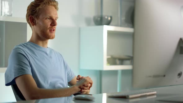 Worker Talking Online Celebrating Success Results at Remote Office Close Up