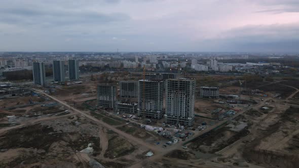 Construction of modern multi-storey buildings. Construction of a new city block.