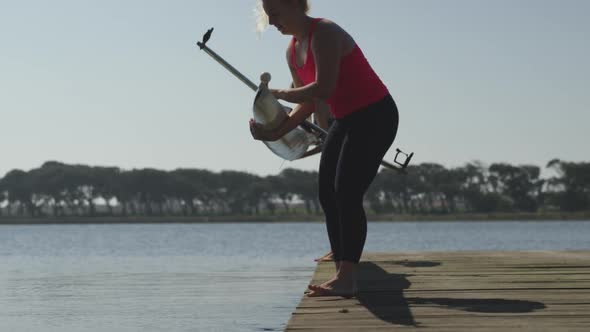 Female rowing team training on a river