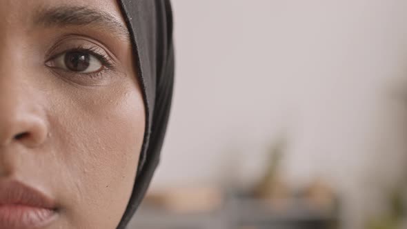 Half-Face Close-Up Portrait of Muslim Woman