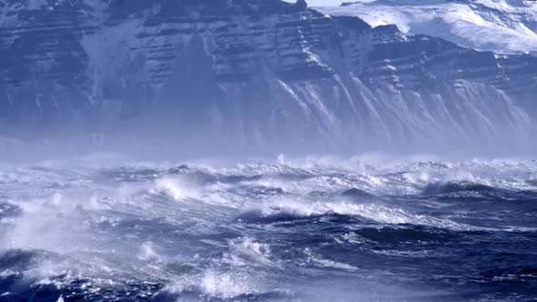 Atlantic Ocean Waves Splashing on Mountain Background