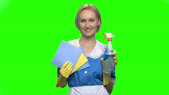 Cleaning Woman Shows Bottle Spray and Napkins