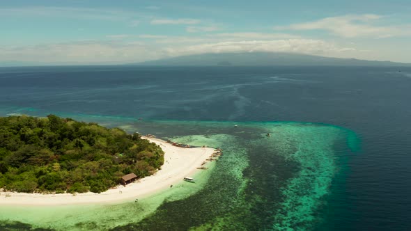 Tropical Island with Sandy Beach. Mantigue Island, Philippines