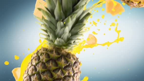 Pineapple with Slices Falling on Cyan Background