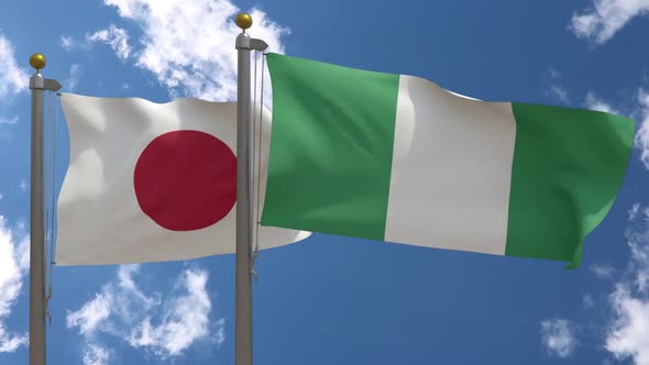 Japan Flag Vs Nigeria Flag On Flagpole
