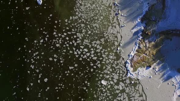 Abstract aerial view of snowy coast in Estonia.