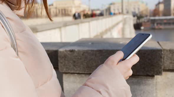 Close Up Woman Hands Holding a Smartphone