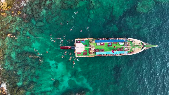 People swim in the azure sea aerial view 4 K Turkey Alanya