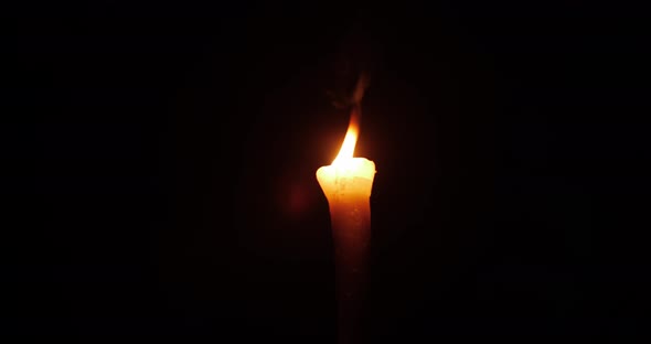 Burning Torch On A Black Background At Night