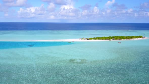 Drone aerial seascape of marine shore beach voyage by lagoon and sand background