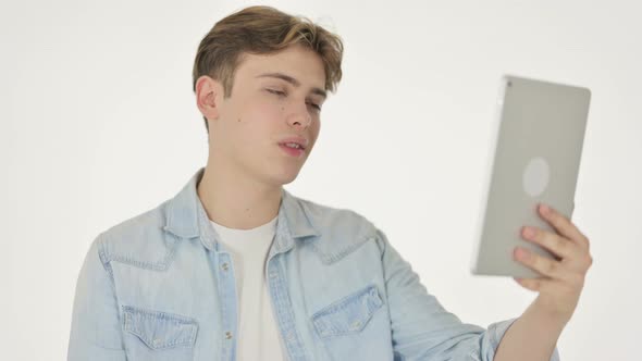 Video Chat on Tablet By Young Man on White Background