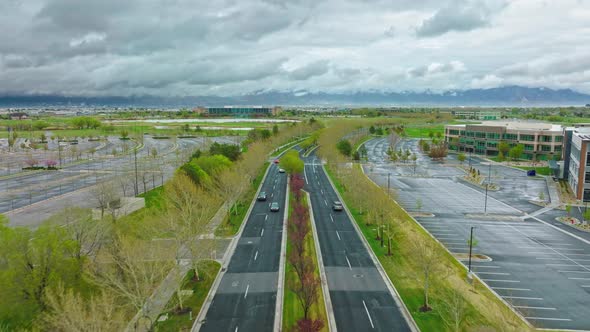 Aerial in a Cloudy and Rainy Day at Lake Park Boulevard at West Valley City Utah - Backwards Movemen