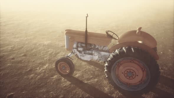 Vintage Retro Tractor on a Farm in Desert