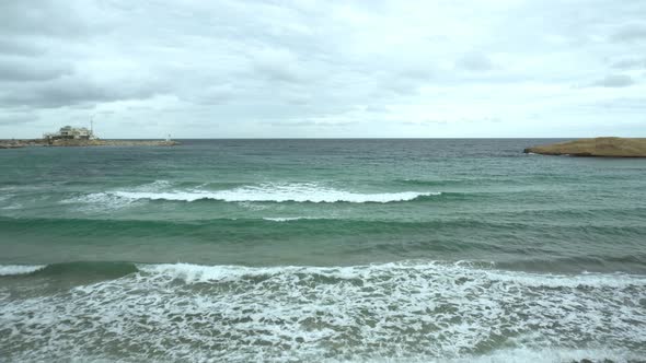 Waves on the Shore. Storm on the Mediterranean Sea. Turquoise Sea