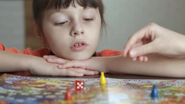 Child with Figure and Dice