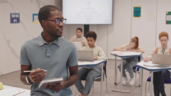 Teacher Talking on Camera in Class