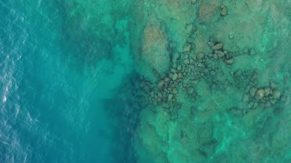 Waves and azure water as a background. View from drone at the sea surface.