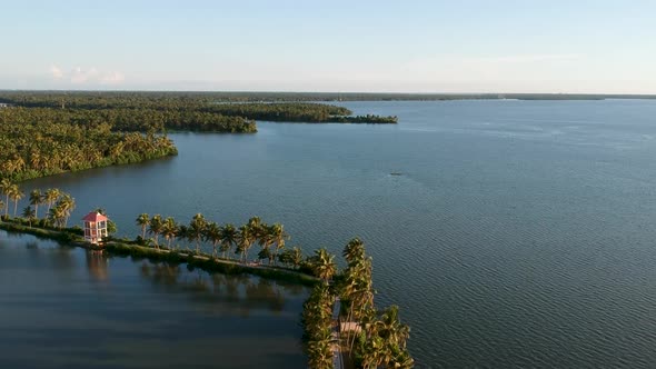 Vembanad lake ,sky aerial view,Sun set,Beautiful sunset,aerial shot,Waves,coconut trees ,