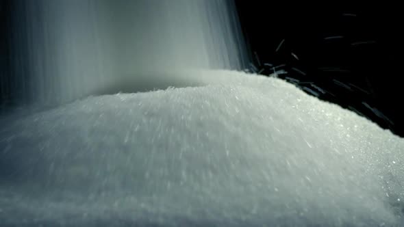 Sugar Pours Into Pile Macro Shot