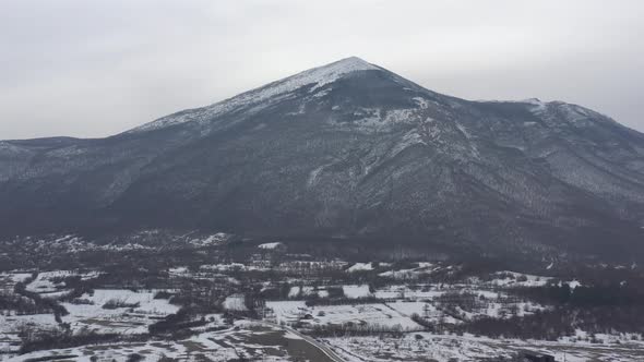 Flying towards Rtanj mountain in Eastern Serbia 4K aerial video