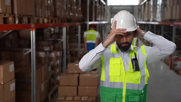 Portrait of Smiling Bearded Male Warehouse Worker