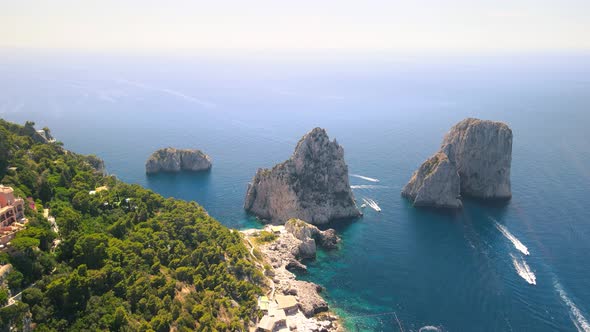 Amazing Aerial View of Faraglioni Rocks Over the Sea in Capri Island Italy