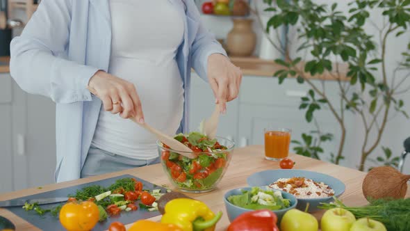 Pregnant Woman Preparing Organic Healthy Food