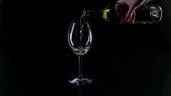 Pouring White Wine Into a Glass, Black, Silhouette, Slowmotion