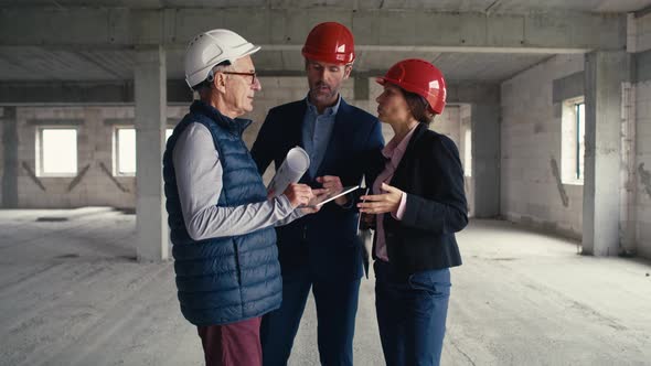 Static wide shot  footage of group of  caucasian engineers