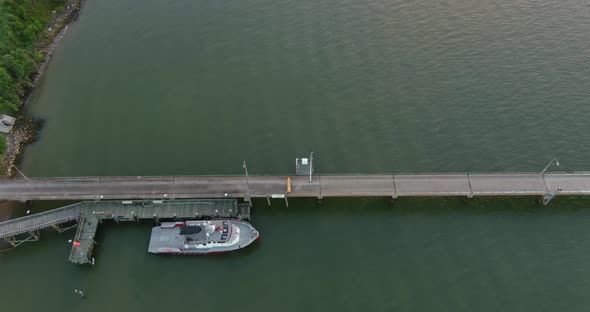 Birdseye view of small boat docked at port