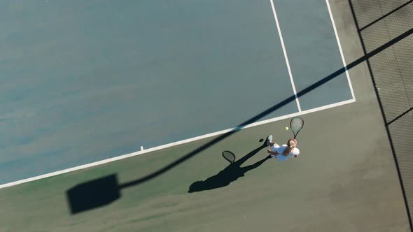 Video of top view of caucasian female tennis player on court