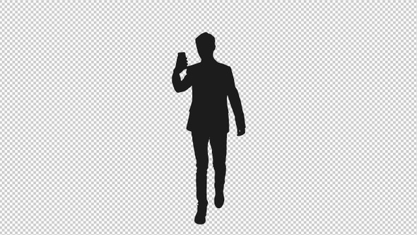 Silhouette of Young Business Man Using Mobile Phone while Walking, Alpha Channel alt