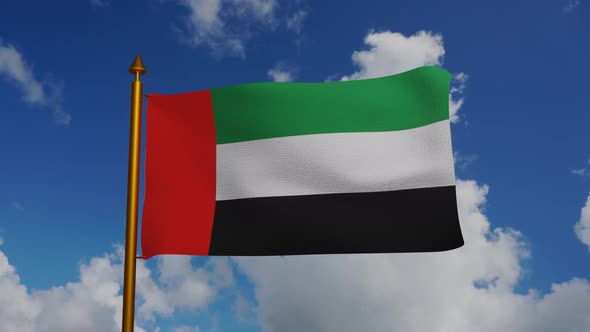 National flag of United Arab Emirates waving with flagpole and blue sky