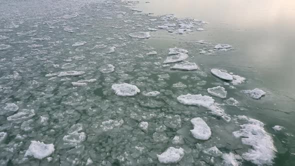 Flying low over ice chunks floating in Utah Lake