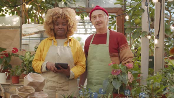 Portrait of Diverse Coworkers in Flower Greenhouse